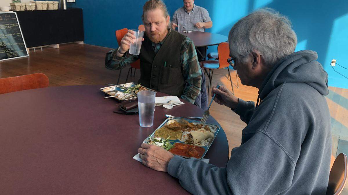 Bellingham resident Scot Nichols, has lunch with Jeff King at the newly opened Simmering Tava at 1311 N. State St. Known for its food truck and serving at the Bellingham Farmers Market, owner decided to open a storefront earlier this month.