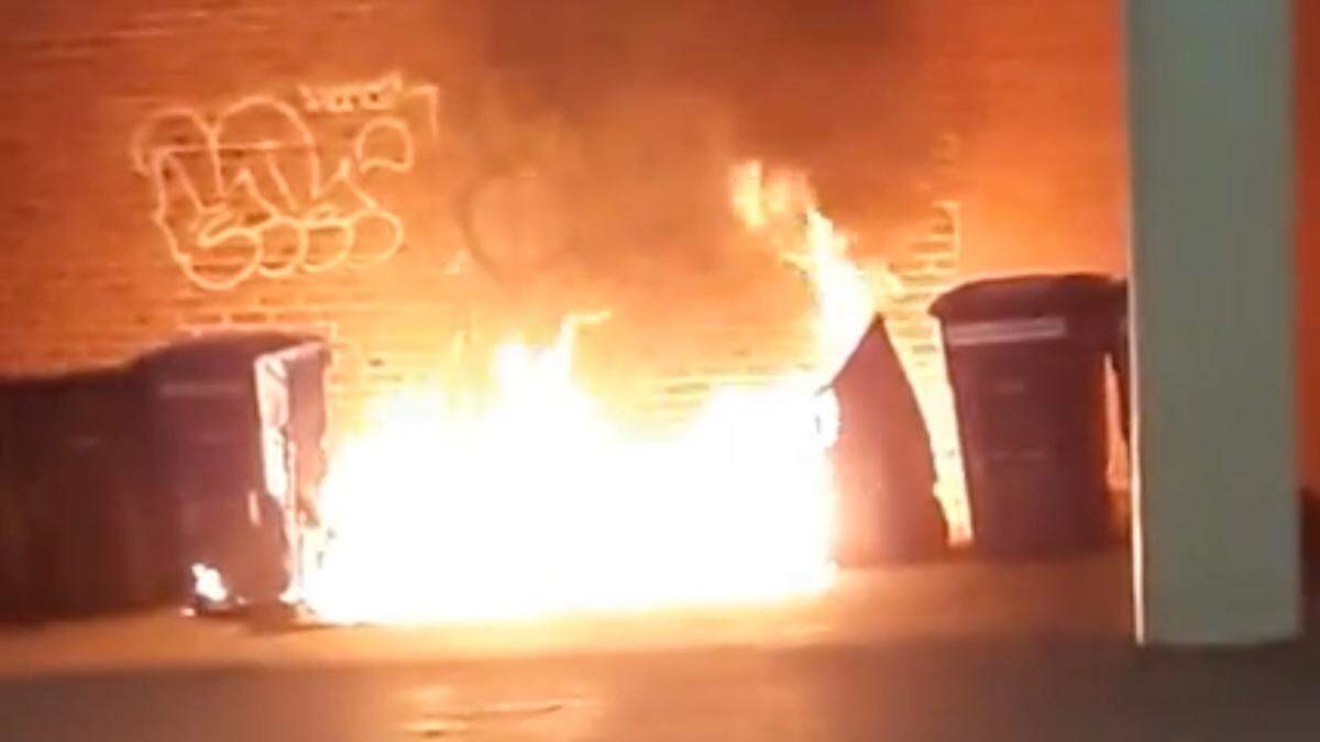 Bellingham Fire crews responded to an outside fire call at 3:30 a.m. Thursday at 112 E. Holly St. and found two large curbside recycling bins in an alley between the Leopold and the Bank of America parking garage on fire.