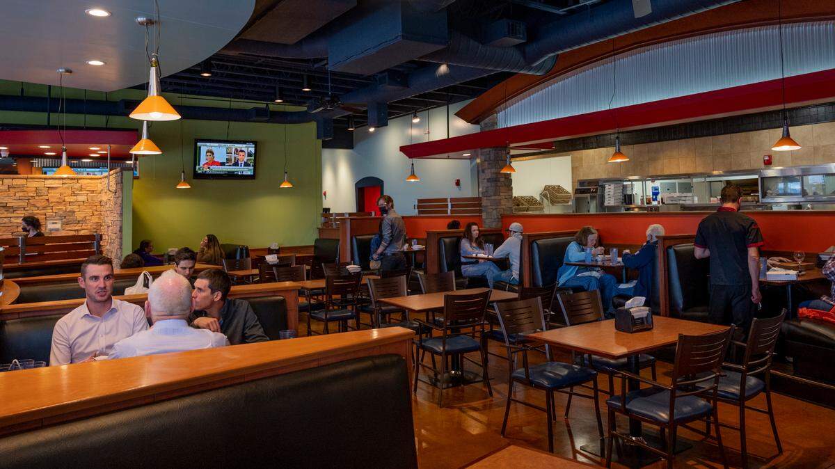 Customers enjoy pizza and other meals at Sliced Family Eatery at Bellis Fair Mall on Tuesday, Oct. 5, in Bellingham.