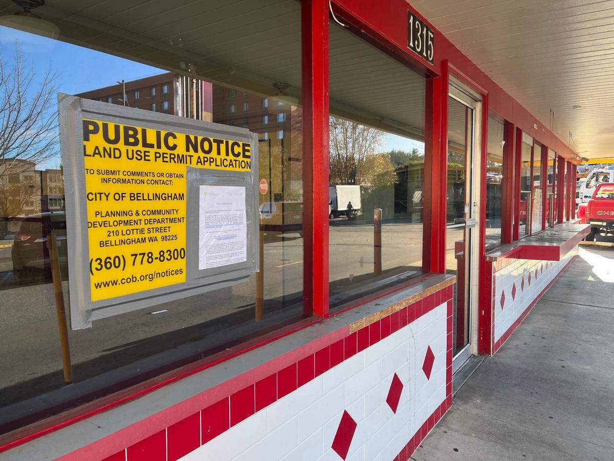 A Public Notice is posted on the outside of the vacant Zane Burger building on Nov. 13, 2023, at 1315 12th Street in Bellingham, Wash. The building is proposed to be demolished to make room for a new, two-story bank building.