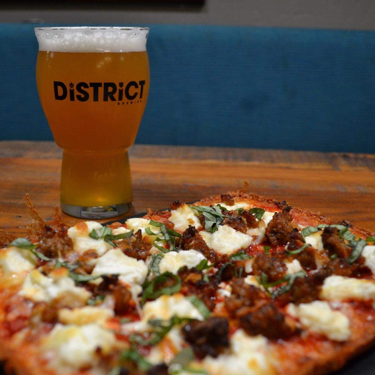 A pizza and beer from District Brewing Co.