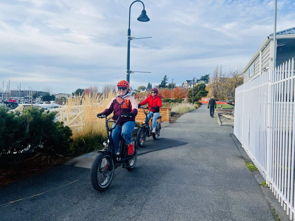 E-bike riders enjoy a sunny on a trail along Squalicum Harbor in Bellingham on Nov. 9.