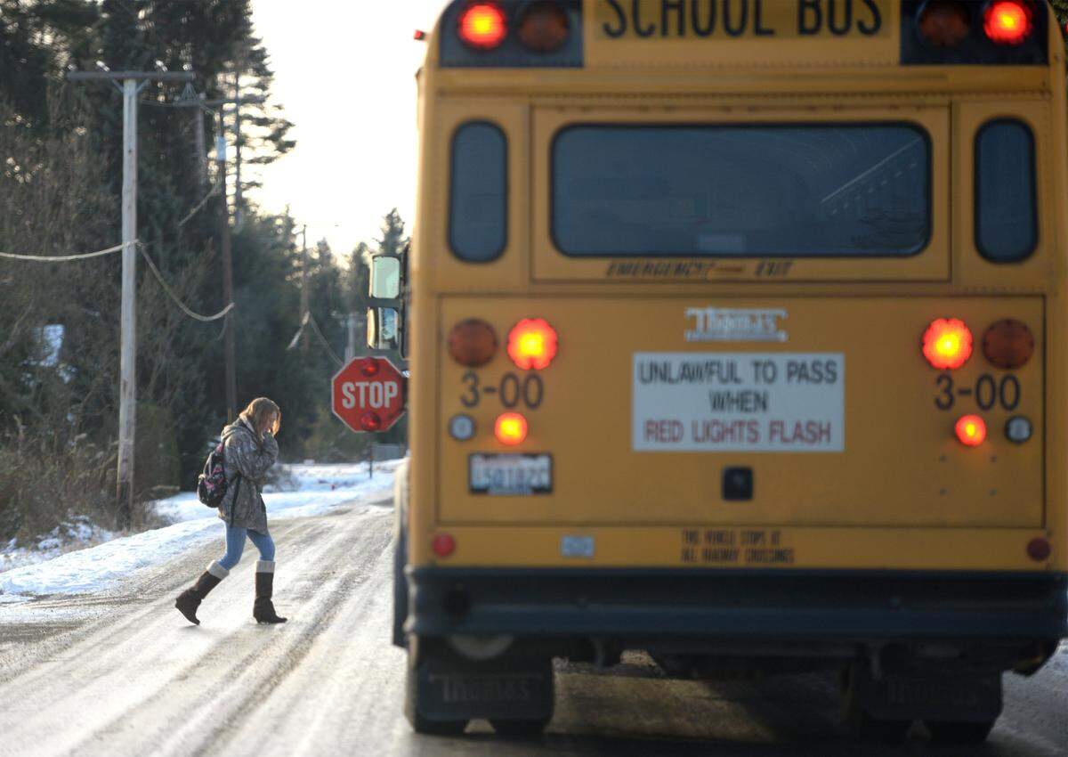 A Blaine student boards a bus on Harborview Road in Birch Bay in December 2016.