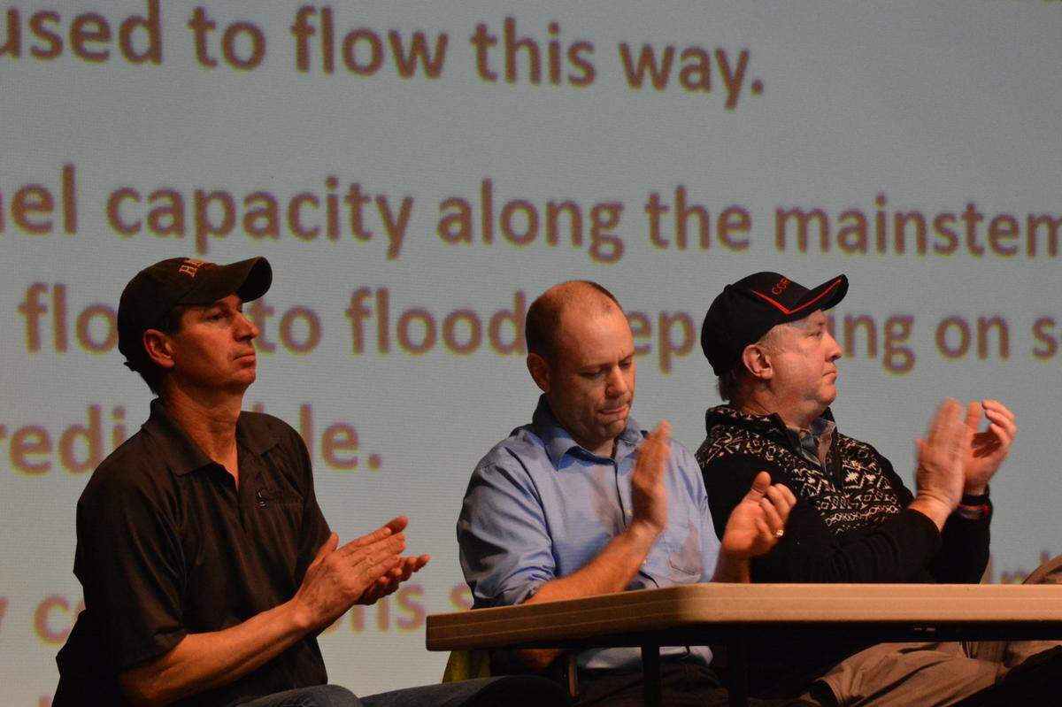 Everson Mayor John Perry of Everson, left, Sumas Mayor Kyle Christensen and state Sen. Doug Ericksen, R-Ferndale attend an informational meeting Feb. 8, 2020 at Nooksack Valley High School for residents of Everson, Nooksack and Sumas who suffered losses in the flooding of Jan. 31-Feb. 2, 2020.