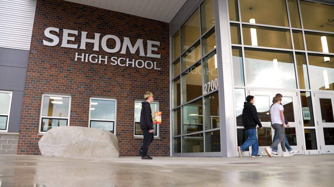 Students walk outside Sehome High School in Bellingham.