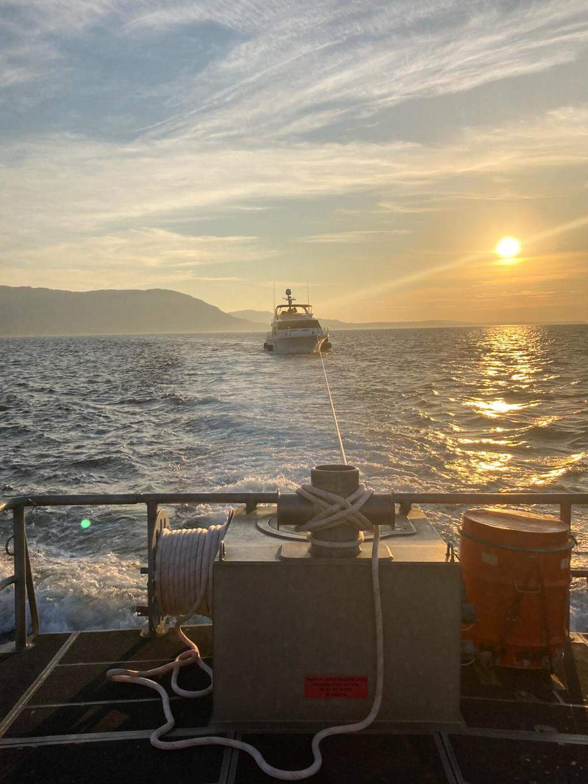 Three people and a dog were rescued from a sinking boat Tuesday afternoon, Oct. 4, that struck rocks entering Echo Bay on Sucia Island.