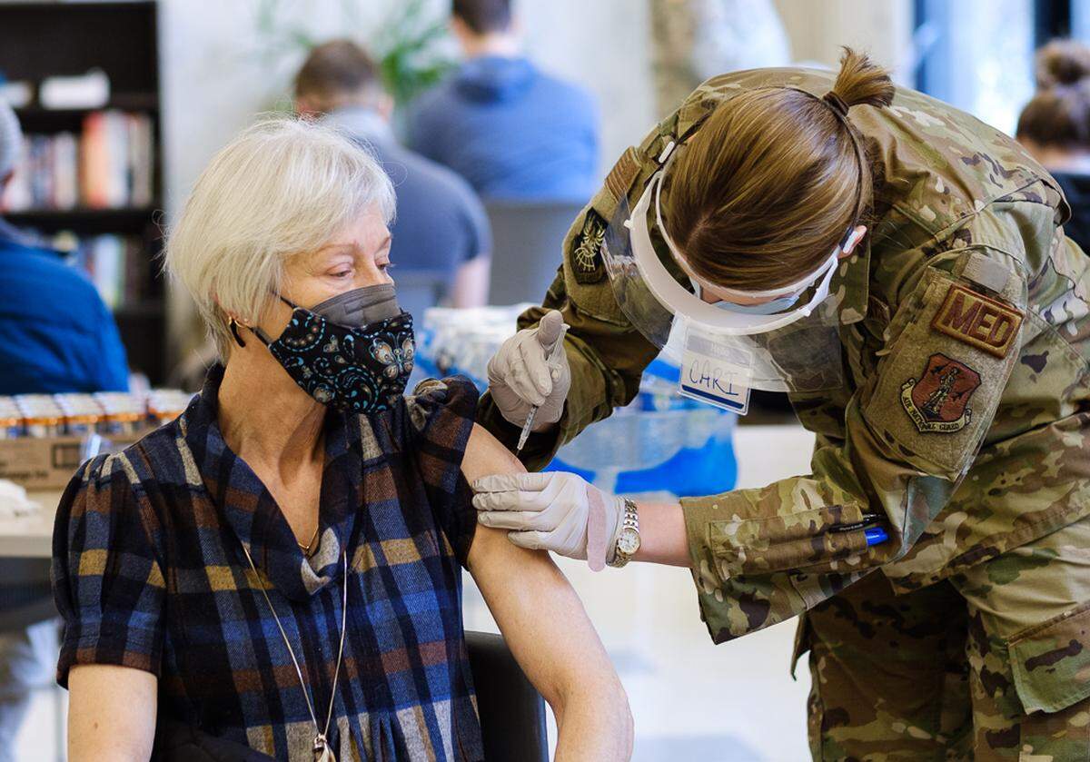 Washington National Guard members provide COVID-19 vaccinations at a mobile clinic that visited independent and senior living communities in Bellingham the week of March 8. The Washington State Department of Health, the Washington National Guard, and Whatcom County Health Department partnered to bring the mobile vaccination team to Whatcom County, focusing on high-risk individuals with difficulty accessing other vaccine providers. 