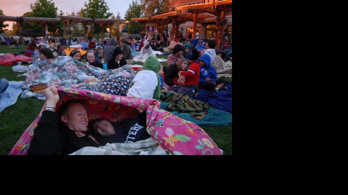 Patrons wait for an outdoor movie in 2008 at Village Green in Fairhaven. With Fairhaven Outdoor Cinema forced to cancel its events in the wake of the coronavirus pandemic, WWU and the Birch Bay Chamber of Commerce and Birch Bay Waterslides are offering socially distanced outdoor movies this summer.