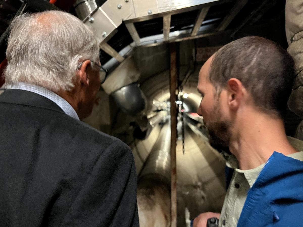 Washington Gov. Jay Inslee chats with Jeff Aslan, utilities manager at Western Washington University, during a tour to check on Climate Commitment Act progress. Inslee and WWU officials went to the Steam Plant and its underground tunnels and to the new Kaiser-Borsari Building on Wednesday, Sept. 11, 2024.