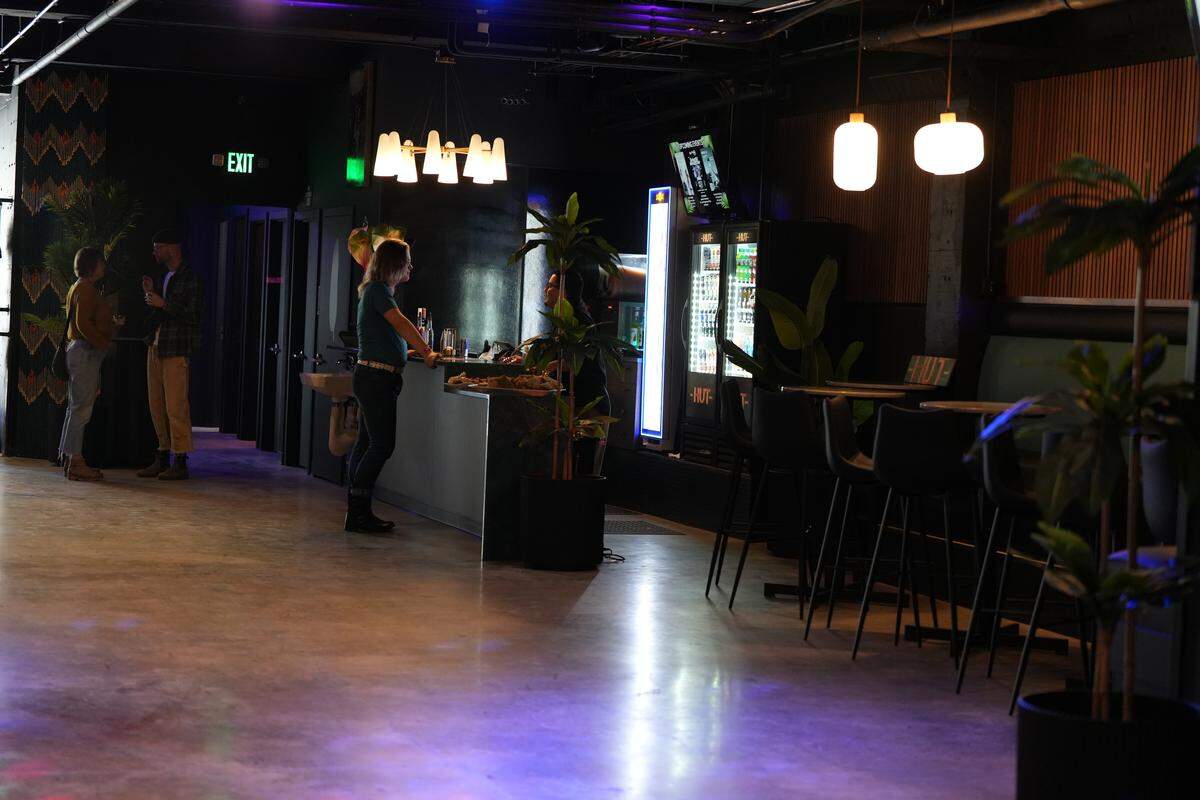 Guests mingle inside -HUT- on Oct. 2.