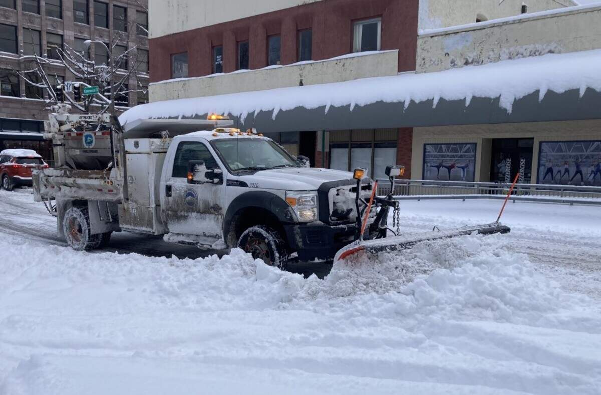 City of Bellingham truck with plow clears snow downtown Tuesday, Dec. 20, in Bellingham.