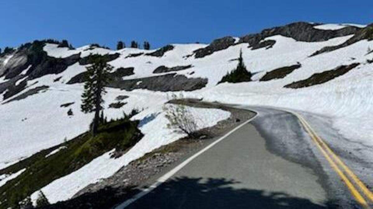 The road is bare on the Mount Baker Highway toward Artist Point on Thursday, July 8, in Whatcom County. A late June heat wave melted a large amount of the snowpack before Washington State Department of Transportation crews could clear it from the roadway.