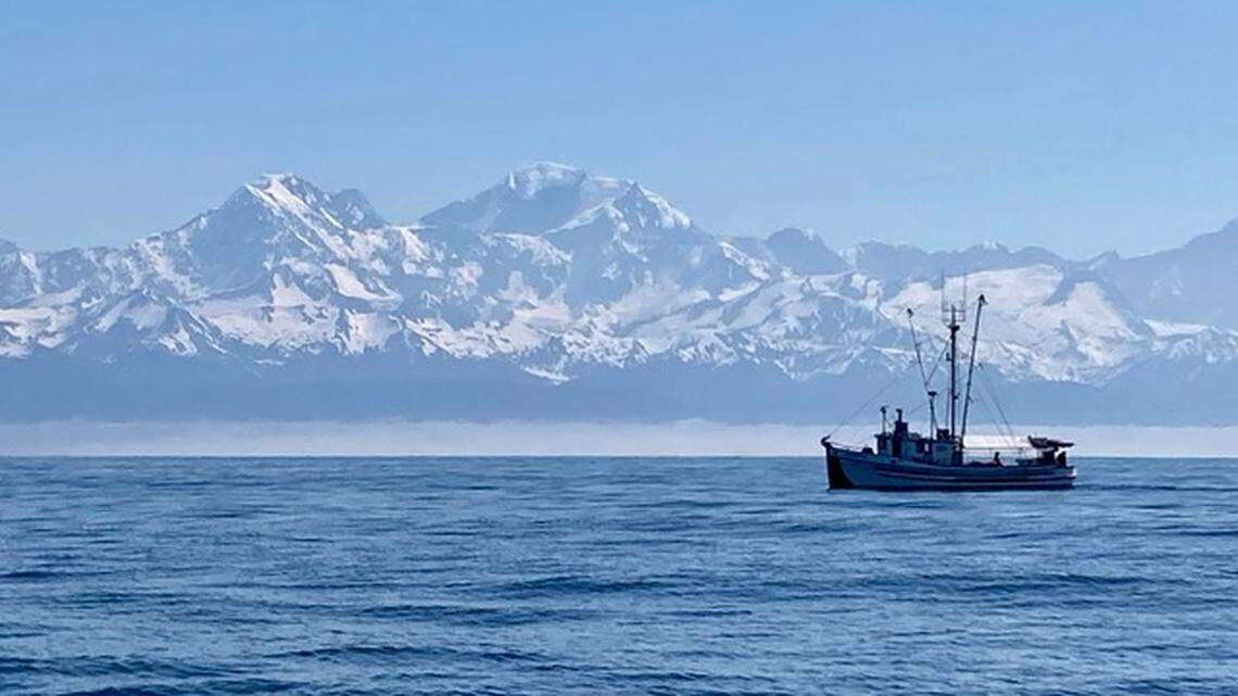 A troller fishes off the Fairweather Range in northern southeast Alaska during 2015 summer salmon season.