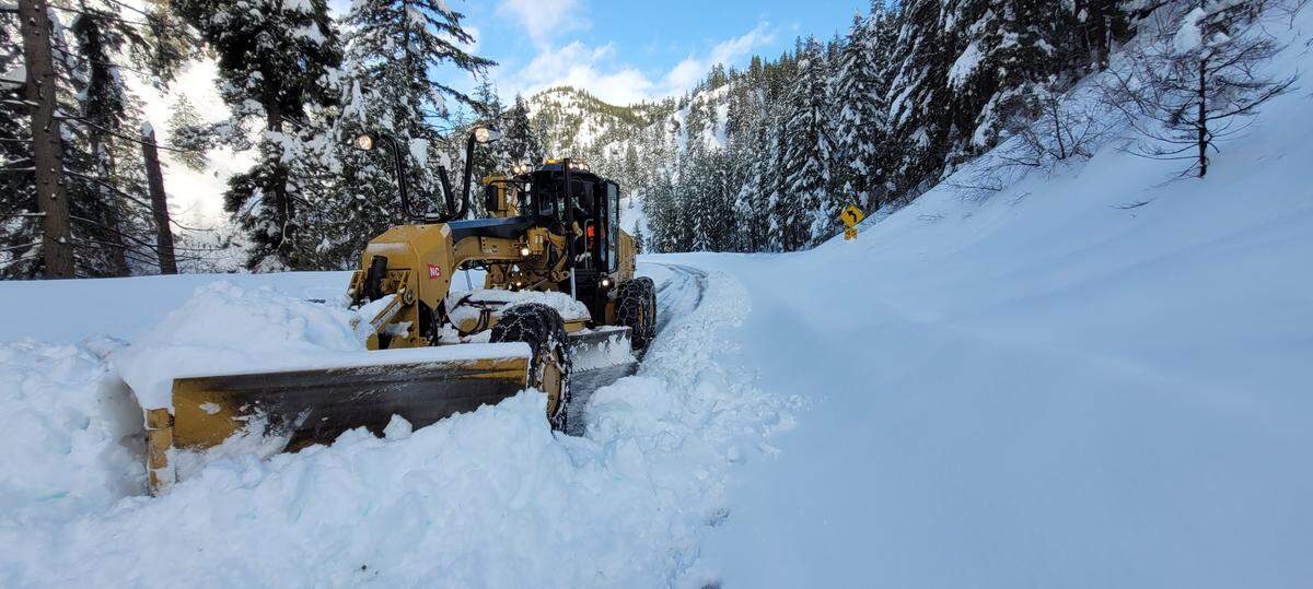 Washington State Department of Transportation snowplow works in deep snow in this photo from the agency’s Facebook page. Friday evening, Jan. 7, the agency posted that “crews are working hard and progress is being made, but there is still a lot of work to go and the passes are unlikely to open before Sunday. After working in safer locations earlier, we were able to make it into the pass areas (Saturday, Jan. 8).”