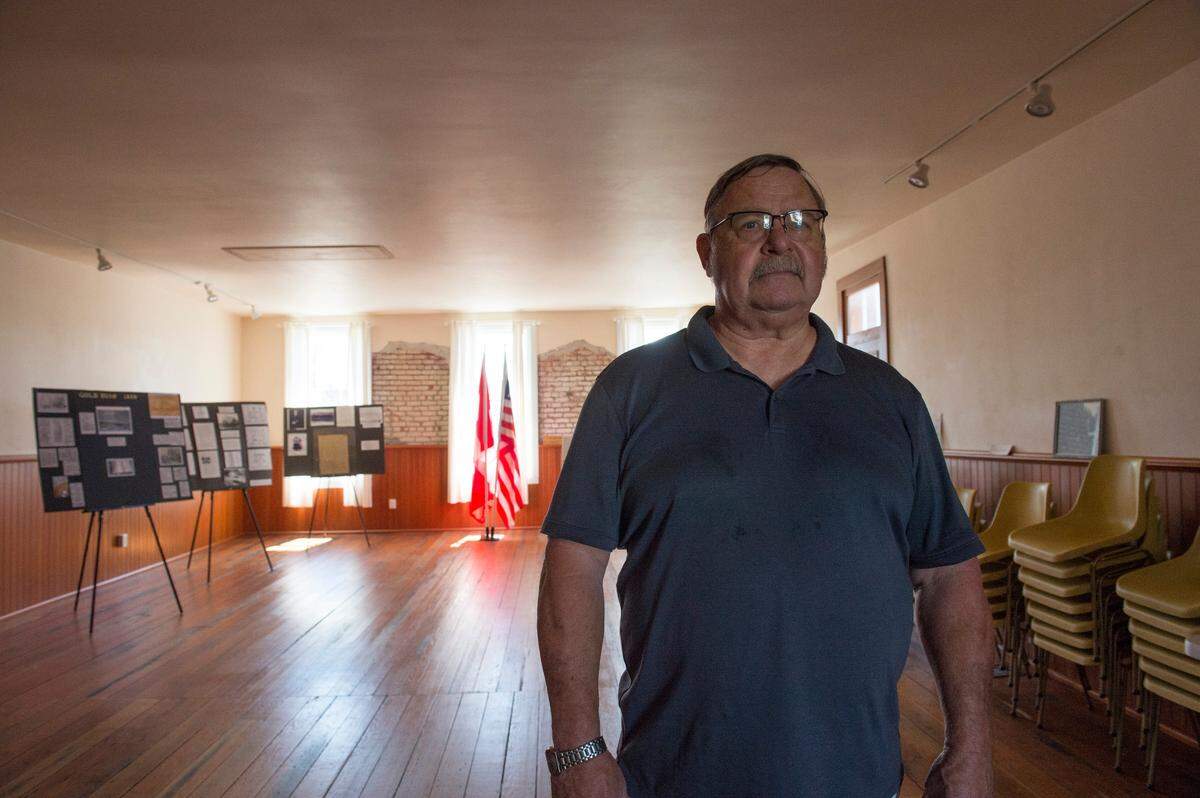 Rick Tremaine, owner of the Old Territorial Courthouse, stands on the first floor of the building. He is now renting it out for various events.