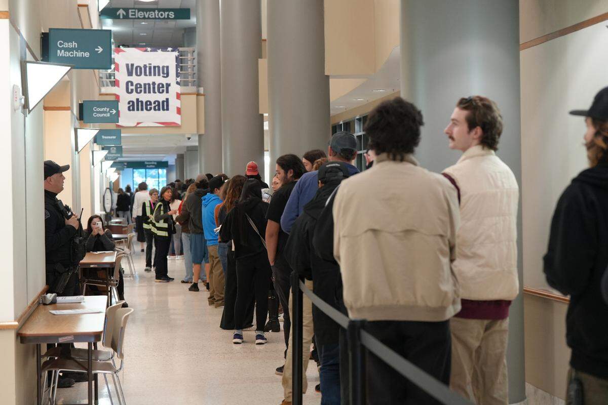 Hundreds of people stood in line to register to vote at the Whatcom County Courthouse on Tuesday, November 5, 2024.