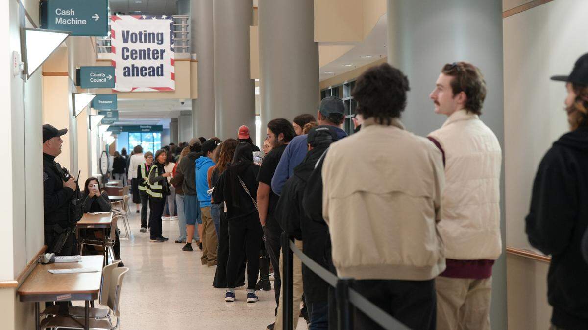 Hundreds of people stood in line to register to vote at the Whatcom County Courthouse on Tuesday, November 5, 2024.