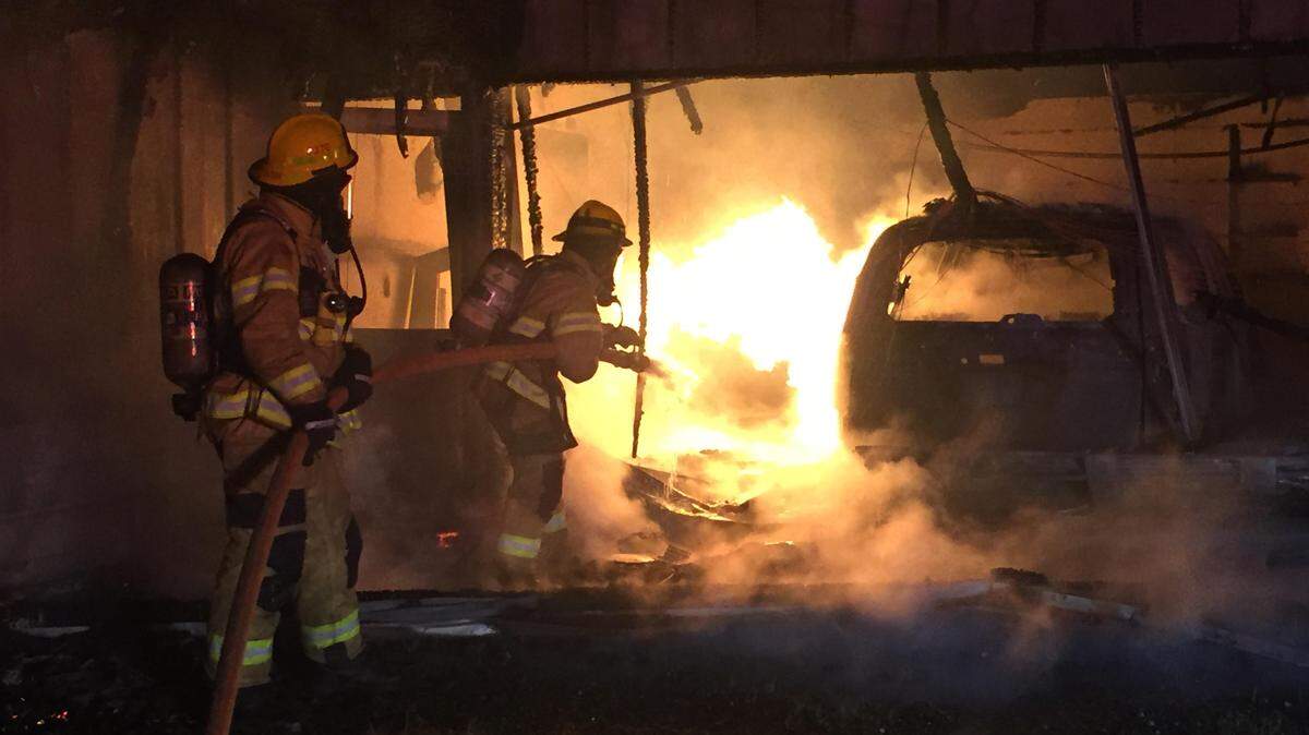 Whatcom County Fire District No. 7 firefighters battle a fire at a house north of Ferndale on Brown Road early Wednesday morning. The house, which was unoccupied, was a complete loss.
