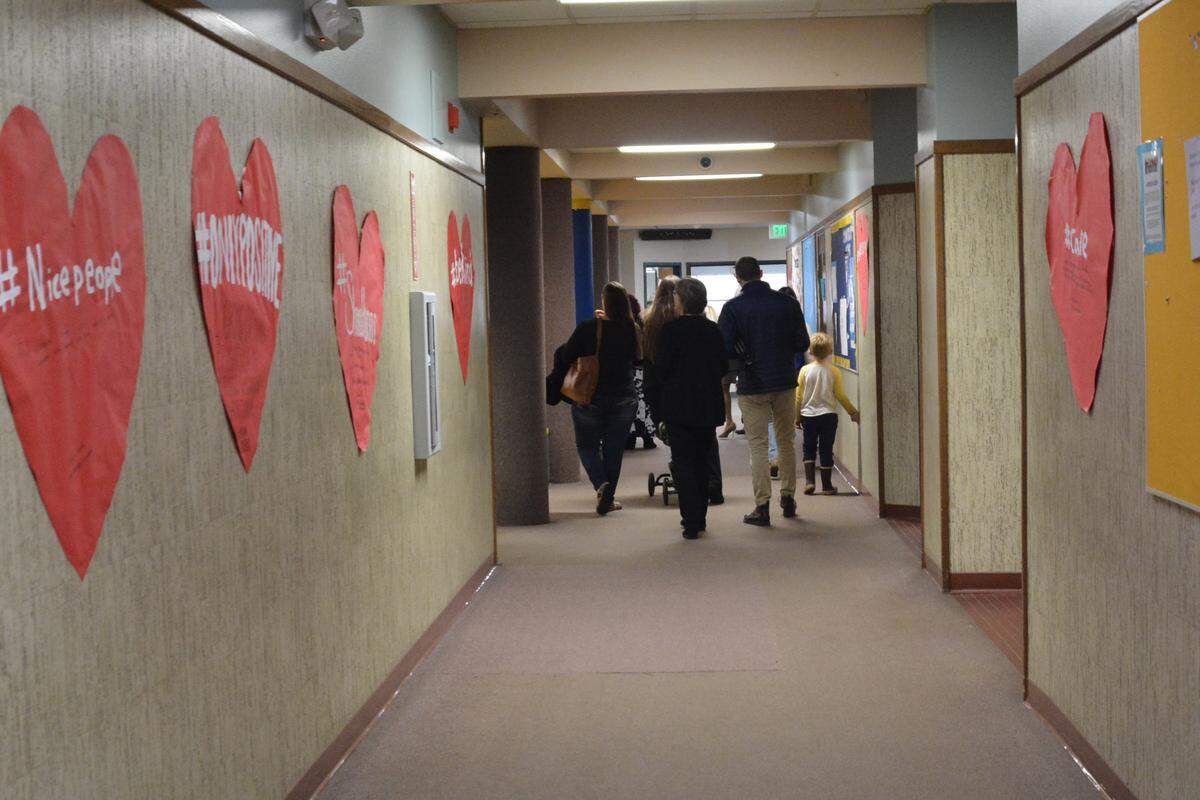 About 200 red heart-shaped posters feature inspirational messages in the halls at Ferndale High, part of the school’s #NoHate project, Nov. 25, 2019.