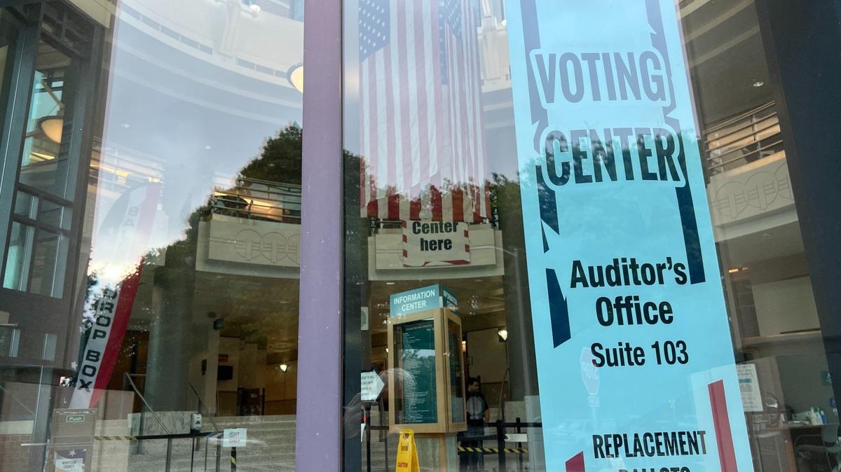 A sign at the Whatcom County Courthouse lets voters know that they can complete ballots in person on Election Day.