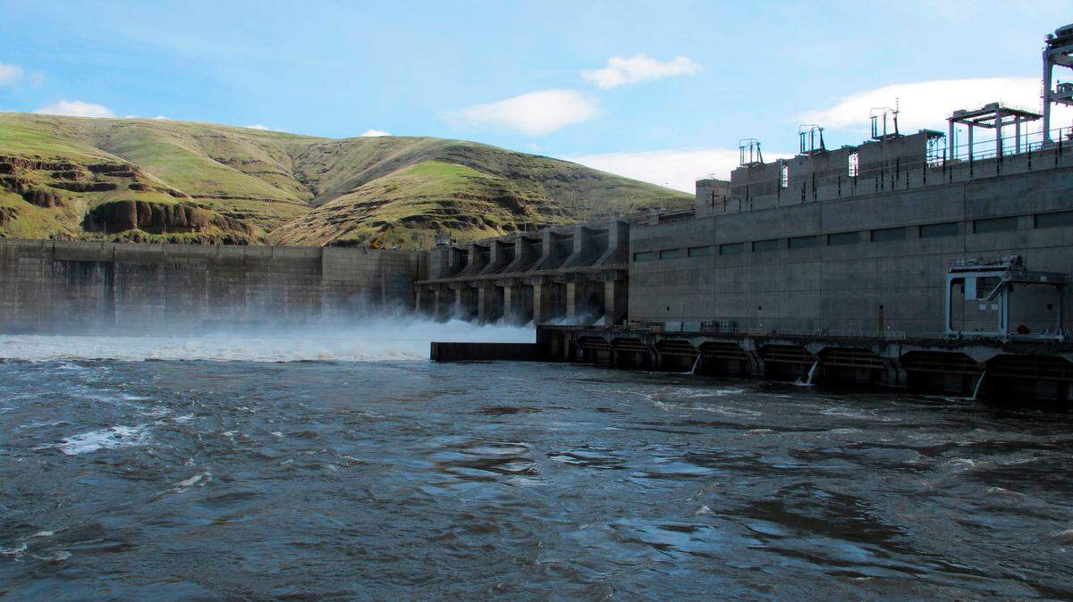 Water moves through a spillway of the Lower Granite Dam on the Snake River in this 2018 file photo.