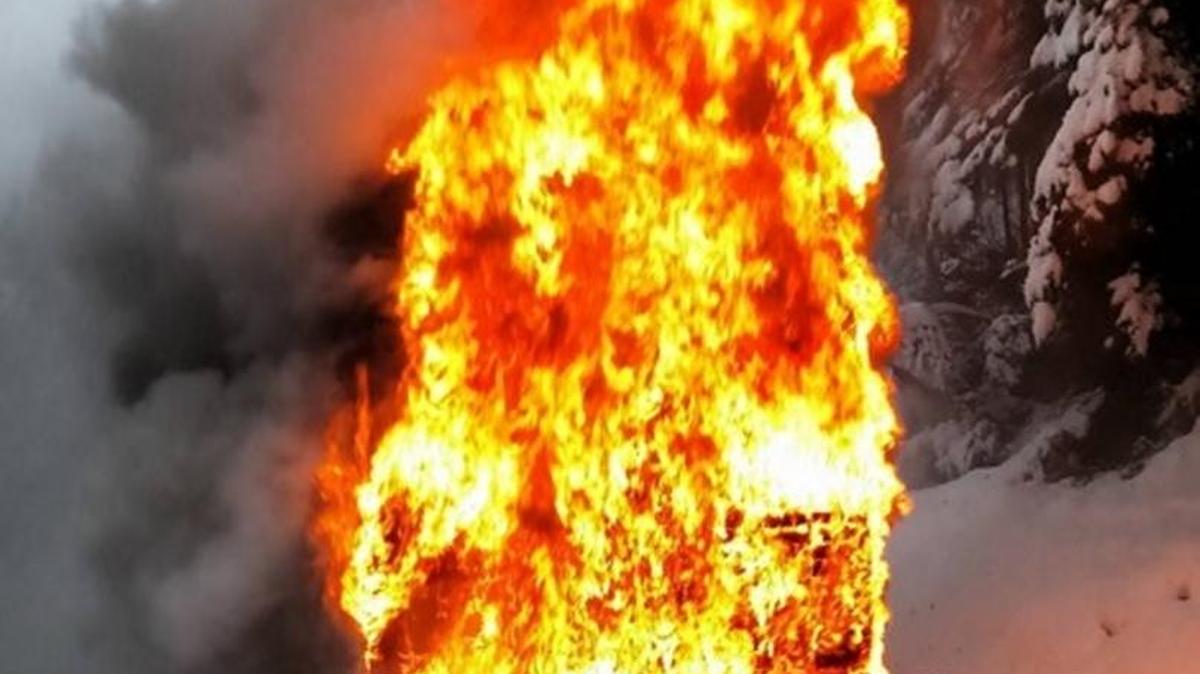 A bus burns on the Mount Baker Highway near the summit on Saturday morning, Feb. 13, 2016.
