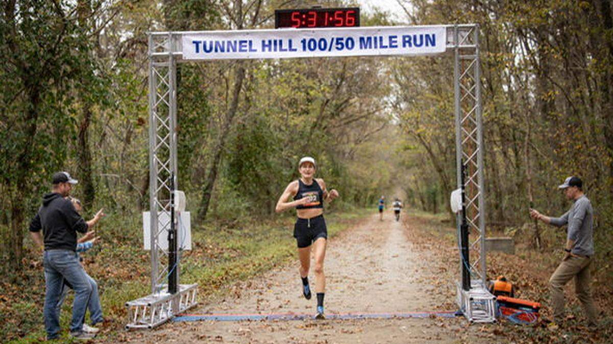 Bellingham resident Courtney Olsen crosses the finish line at Tunnel Hill in Vienna, Ill. on Saturday, Nov. 9. Olsen’s finished the 50 mile race in 5:31:56, over eight minutes under the recognized world record.