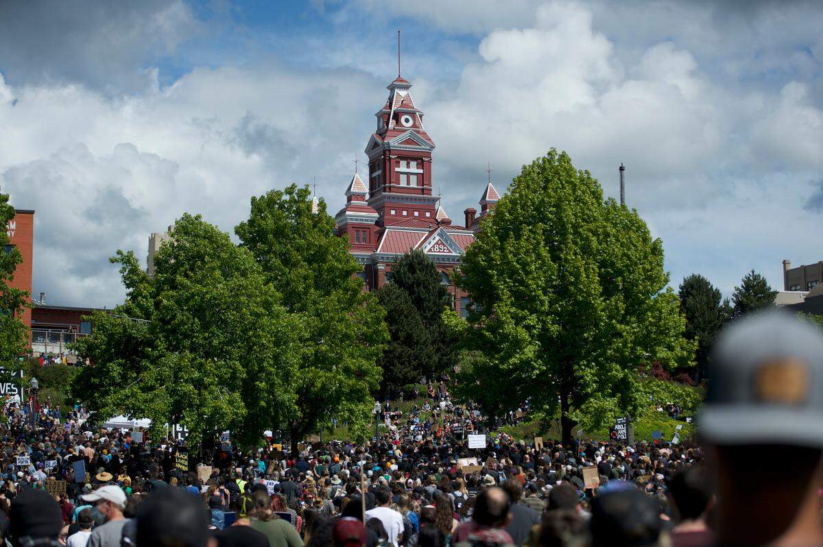 As many as 7,000 people attended a Solidarity Rally Saturday, June 6, at Maritime Heritage Park in Bellingham to bring the community together “to make a stand for the injustice of a failed system,” according to organizers
