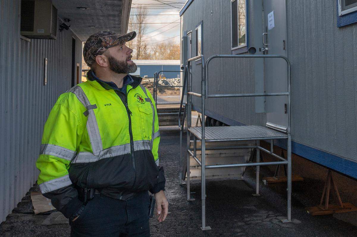 Mayor Kyle Christensen looks at the portable building that is currently being used as city hall since historic flooding damaged the city hall building on Nov. 19 in Sumas.