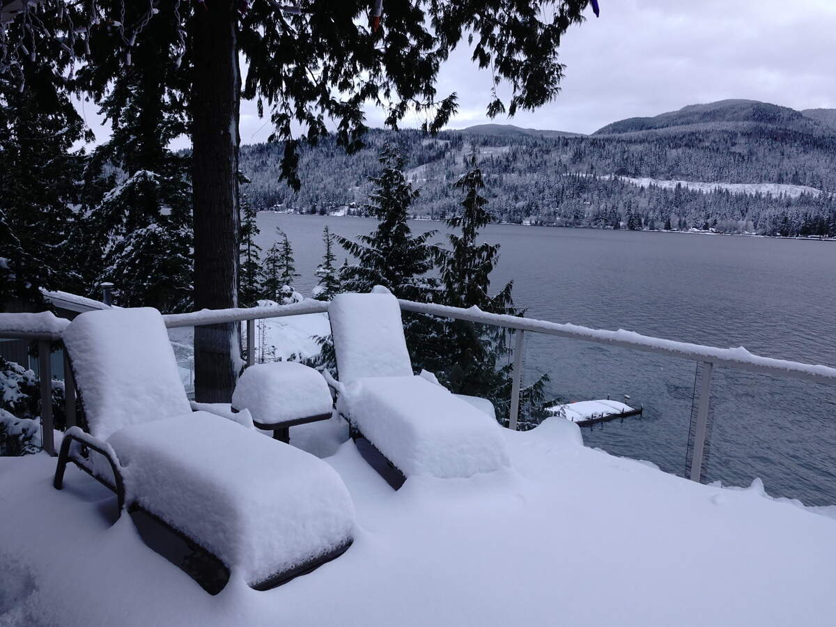 Snow covers a deck near Lake Whatcom Wednesday, Jan. 15, 2020, in Whatcom County, Washington.