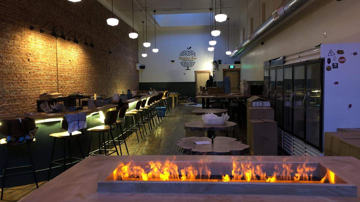 The fire table was one feature of the Thousand Acre Cider House in Bellingham, which closed in October 2021.