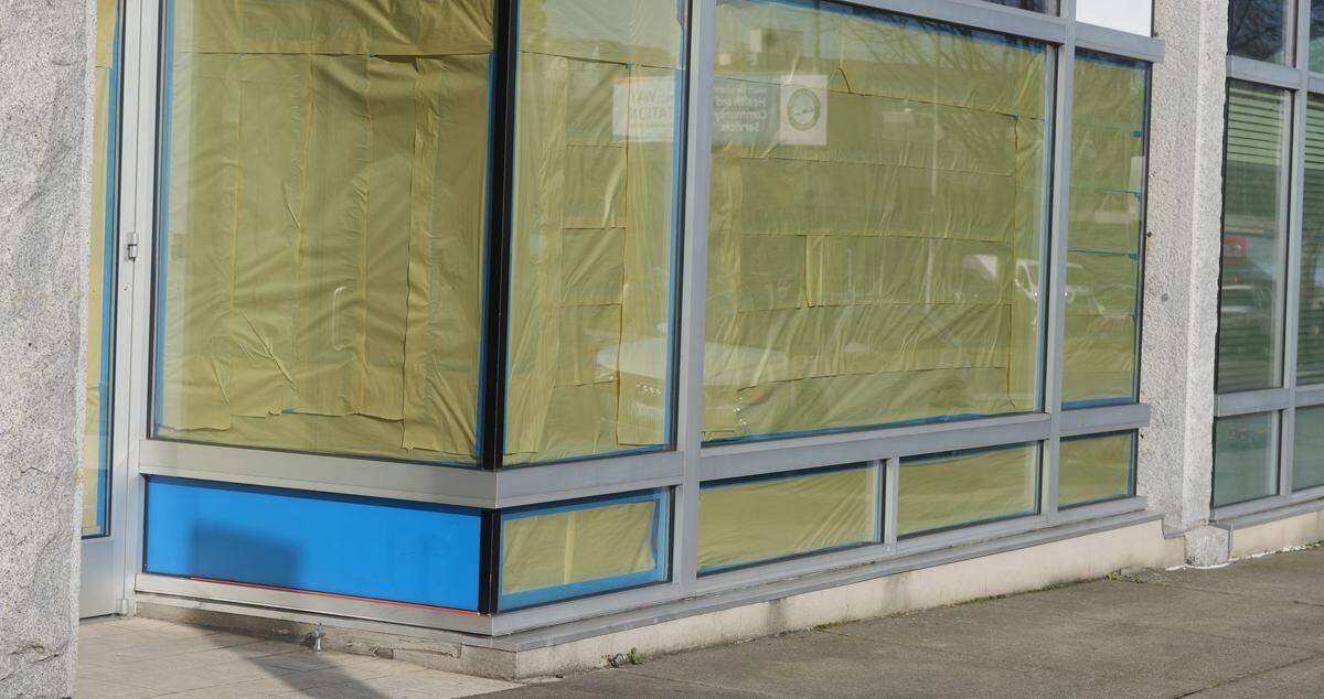 The windows of a vacant storefront on State Street in downtown Bellingham, Wash., were covered with paper on February 5, 2026.