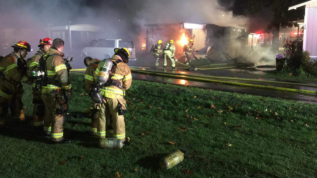 Whatcom County District 7 fights fire at a mobile home fire in the 1900 block of Trigg Road Friday morning in Ferndale.