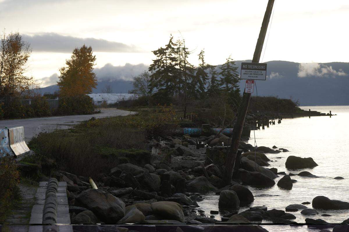 A toxic clean-up site is visible beyond Glass Beach on November 17, 2025, in Bellingham, Wash. The polluted site is expected to become a public park after construction and cleanup.