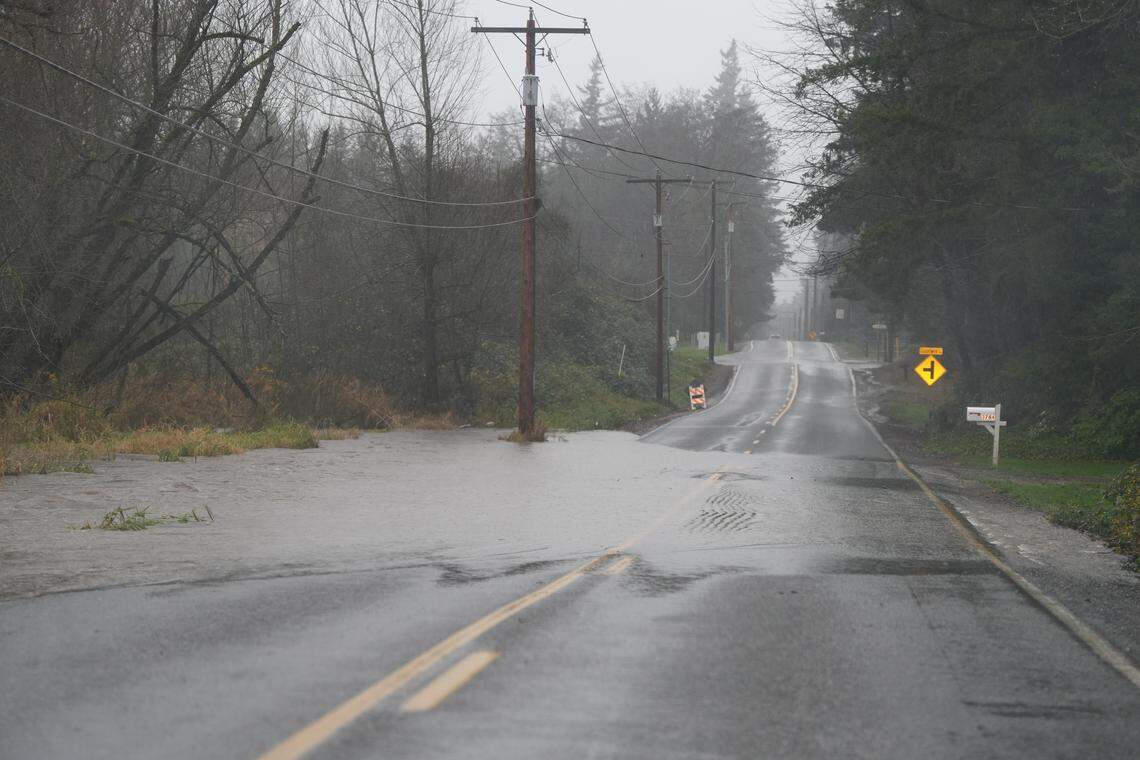 Water pooled over a roadway south of Everson on December 10, 2025, as heavy rainfall threatened flooding across low-lying areas of Whatcom County.