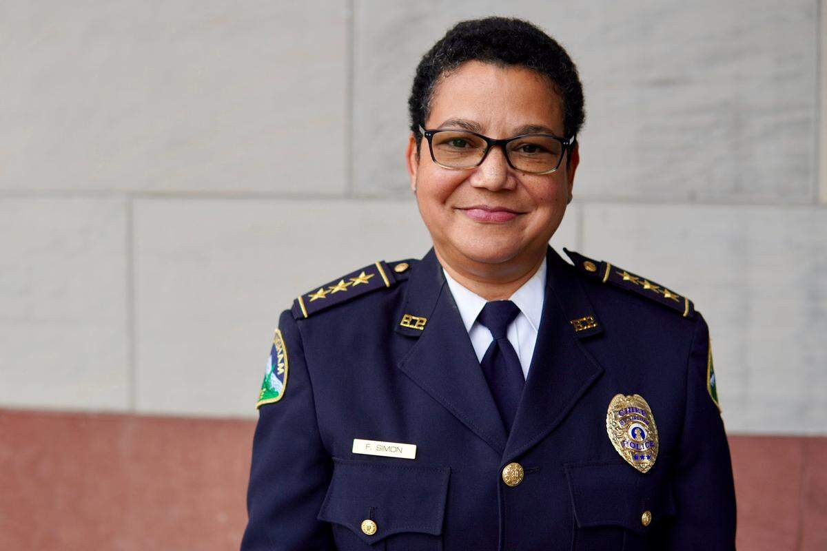 Bellingham Interim Police Chief Flo Simon was passed the chief’s badge Jan. 4, 2021, from retiring Chief David Doll. Simon has said that she intends to retire once a new chief is chosen.