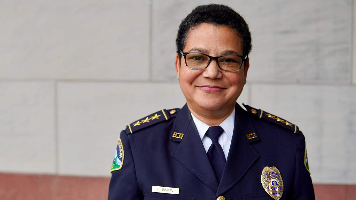 Bellingham Interim Police Chief Flo Simon will delay her retirement until a successor is named.