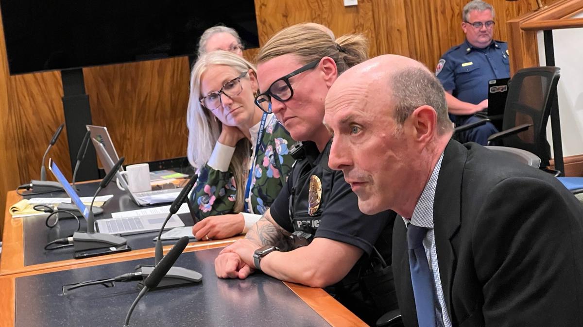 Whatcom County Prosecutor Eric Richey, right, addresses the Bellingham City Council’s Committee of the Whole on Monday, July 1, 2024, in Council Chambers at City Hall in Bellingham, Wash. Richey was discussing the Whatcom County Drug task force. To his left are Bellingham Police Chief Rebecca Mertzig and Mayor Kim Lund.