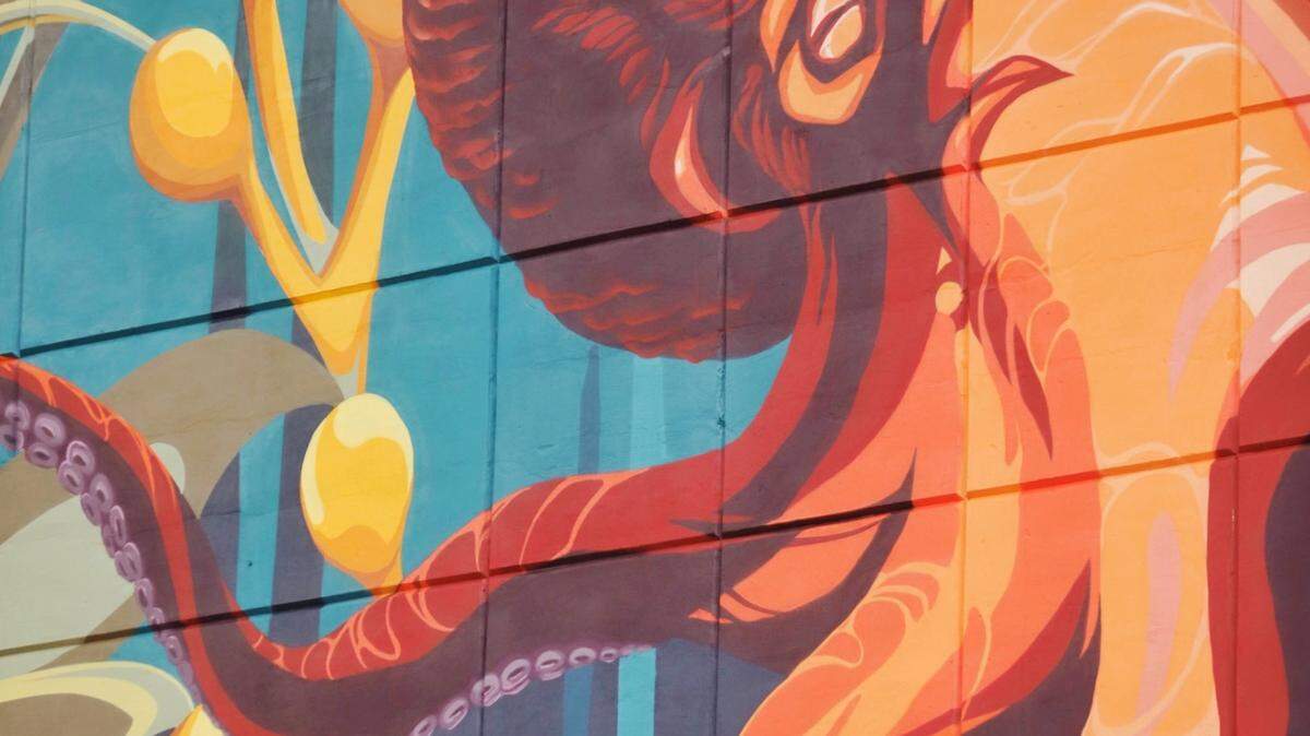Muralists Gretchen Leggitt and Erika Rosendale worked together to create this octopus design in June 2024 on the side of a Bellingham housing development on the corner of Lincoln Avenue and Samish Way in Bellingham, Wash.