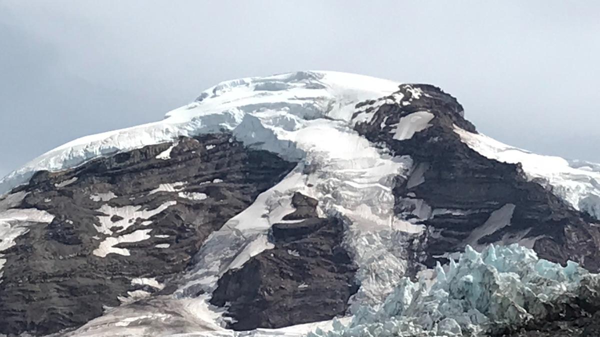 Bare rock and glaciers are seen on Mount Baker from the Heliotrope Ridge Trail in August 2020. Snowpack in the North Cascades is critically low this winter.