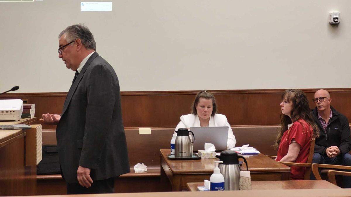 Roseanne Louise Paden, 38, second from right, listens as her defense attorney, Starck Follis, left, speaks to the Whatcom County Superior Court Thursday, March 30, during her second-degree murder sentencing hearing in Bellingham.