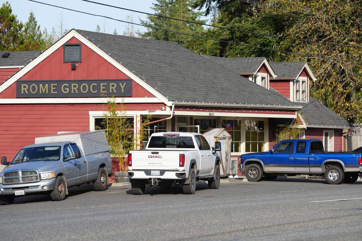 Cars are parked in front of Rome Bakery and Market on November 11, 2025, along the Mt Baker Highway in Bellingham, Wash.