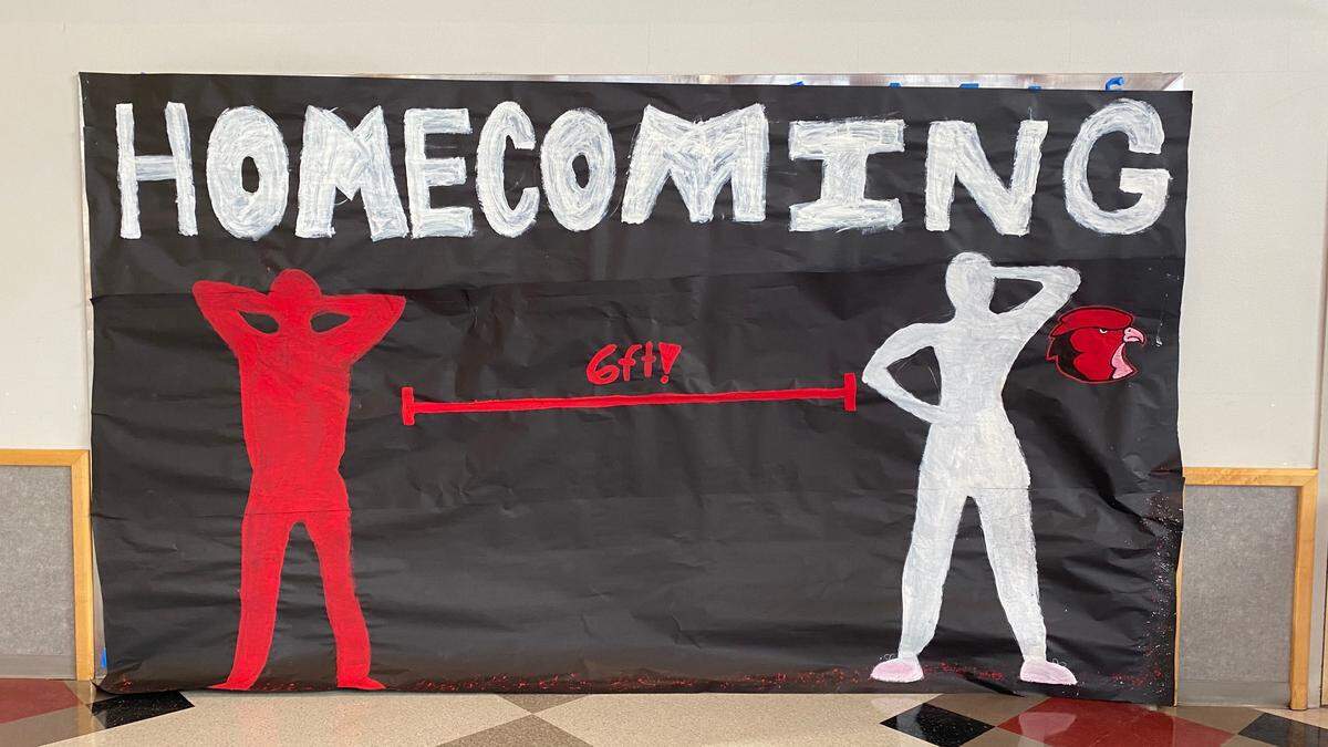 A sign reminds Bellingham High School students to maintain social distance on Friday, March 26.