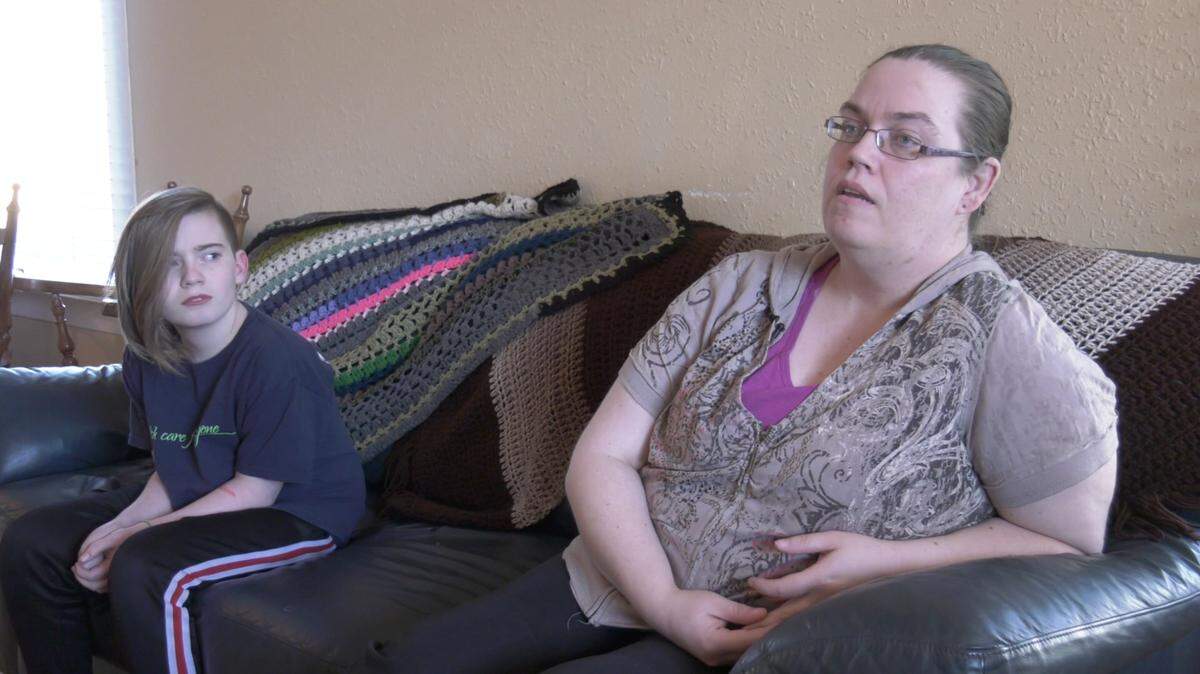 Jolynn Stoumbaugh and her son William Fifield, 13, sit in their living room in Ferndale in March.