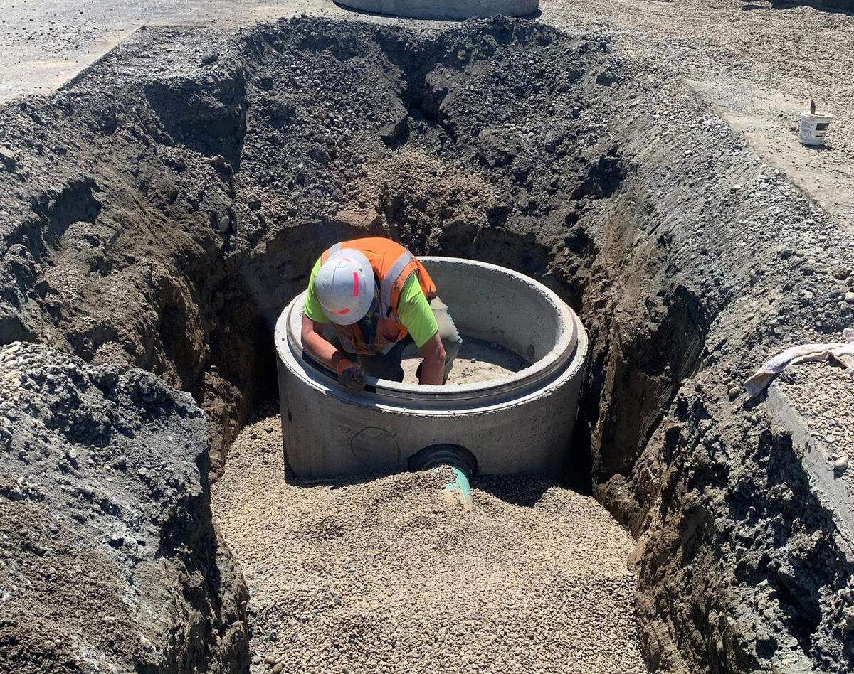 A city employee works on the annual sanitary sewer rehabilitation project in summer 2020 in Bellingham.