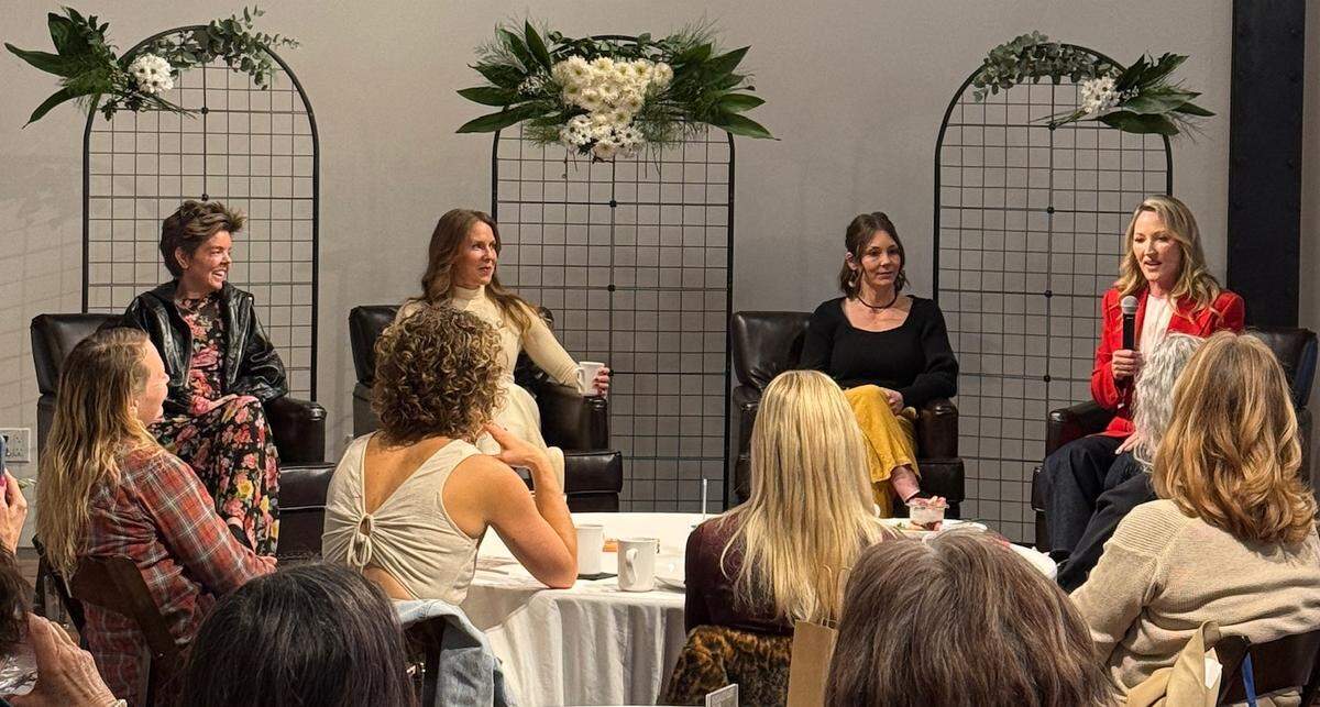 From left, panelists Dr. Kelly Casperson, Audra Query, Keely Shannon and Debbie Biery address the audience at the 2026 Women in Business Panel held March 12 in the ballroom at Chuckanut Bay Distillery in downtown Bellingham.