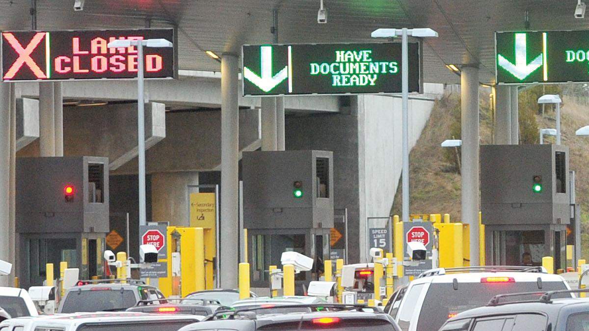 Canadian cars heading into the U.S. line up at the Peace Arch border crossing in Blaine on Jan 28, 2013.