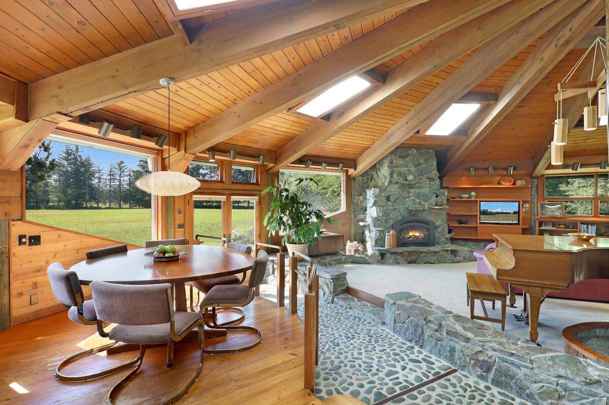 An inside view of the Nautilus home shows its river rock flooring, several skylights and open concept near Everson.