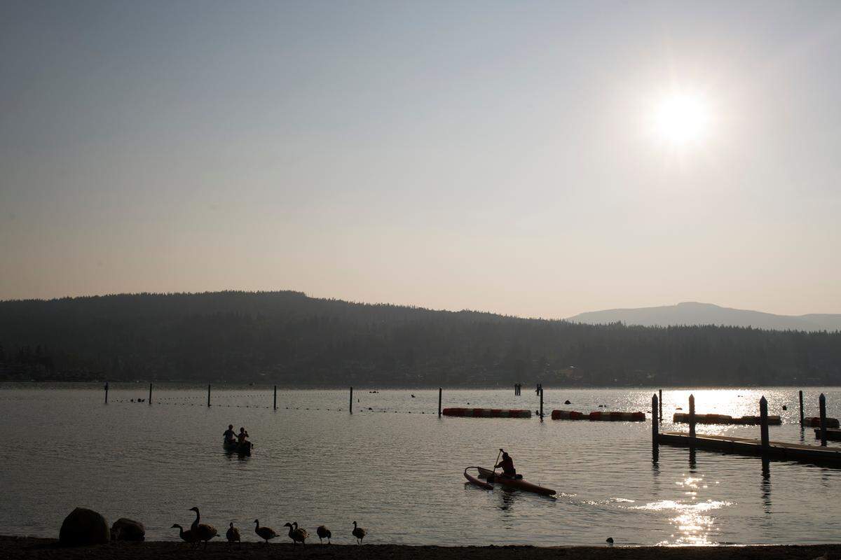 Smoke makes for a hazy sunrise over Lake Whatcom on Monday.  Smoke from the Northern California wildfire and other blazes is beginning to affect air quality in Whatcom County.
