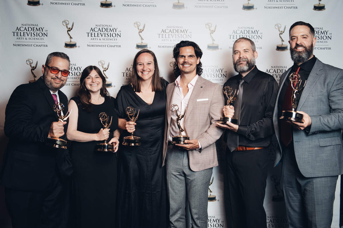 Left to right: Greg Cohen, Sarah Hoffman, Sarah Menzies, Samuel Wolfe, Tyler Rowe, and Adam Spiro Brown celebrate their Northwest Emmy award for Short Form Content: Historical/Cultural at Fremont Studios, Seattle. June 5, 2026.